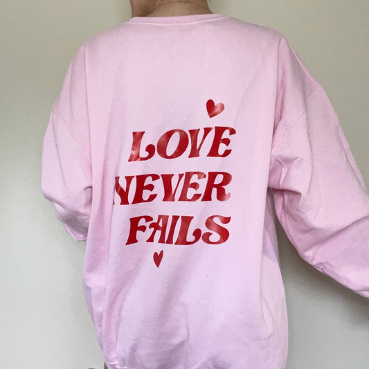 Love Never Fails Crewneck
